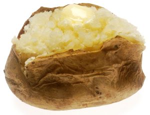 baked potato, cut open with butter on top